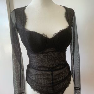 NWT Victoria’s Secret black lace thong bodysuit size 32 C.